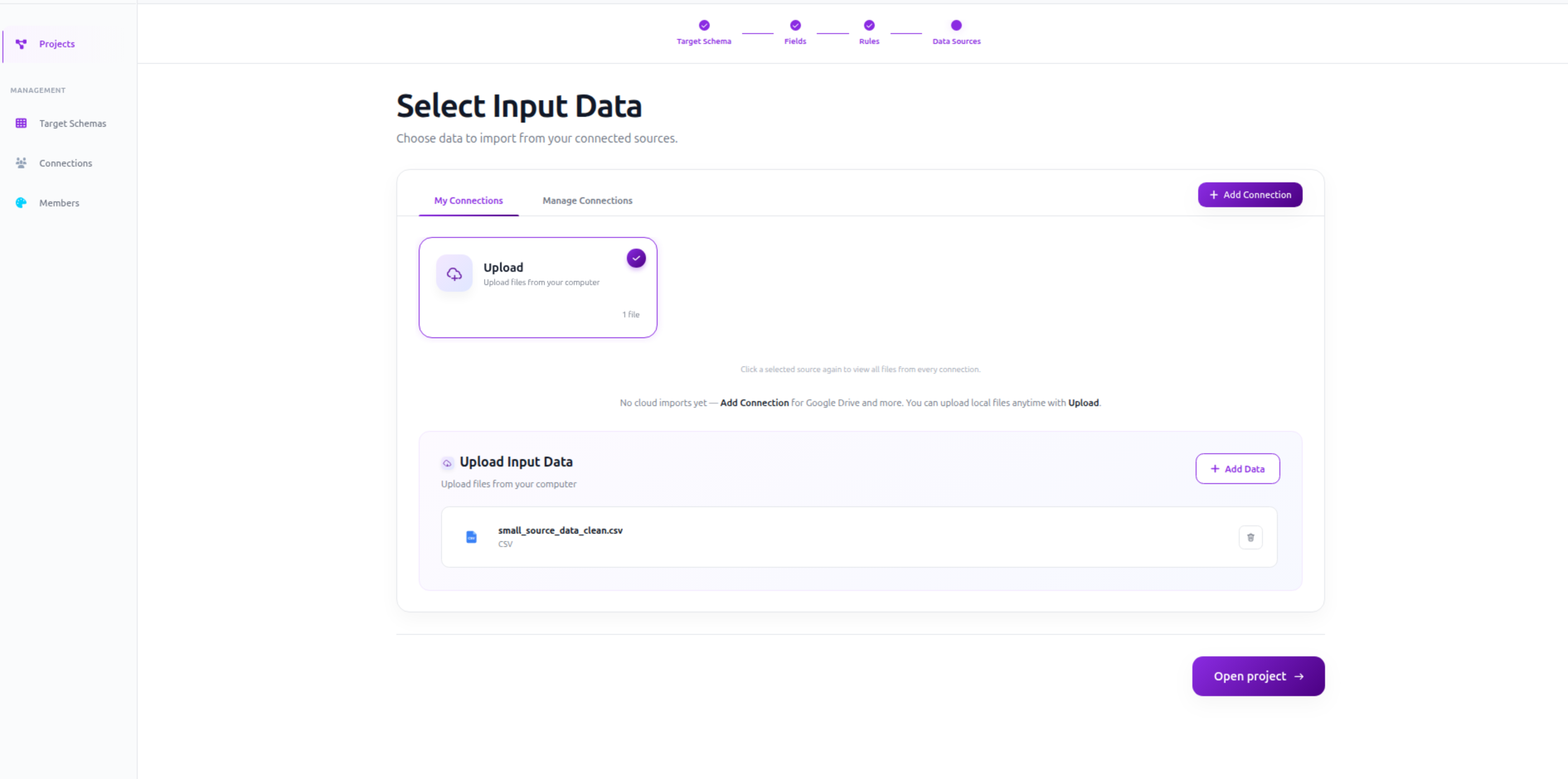 Select Input Data screen showing connected sources, an Upload card, and an uploaded CSV ready to be imported into the project.